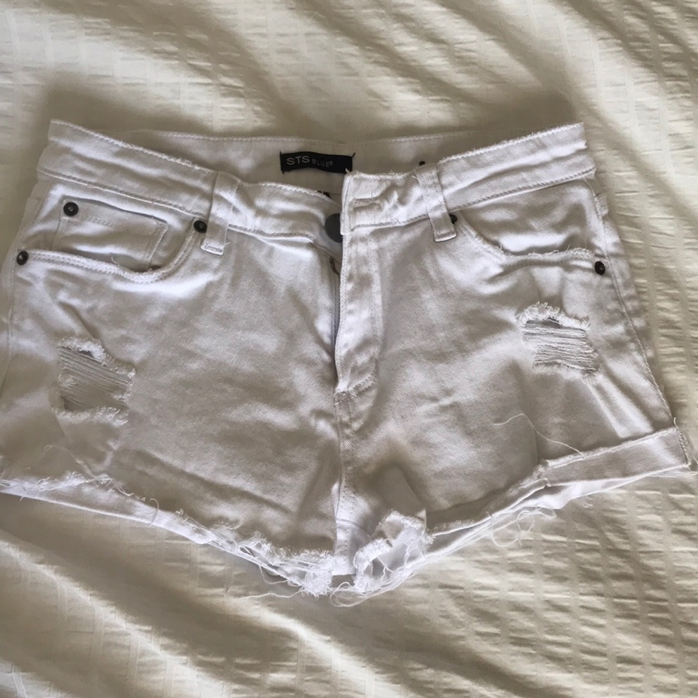 White distressed shorts